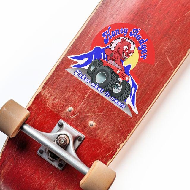 Playful Honey Badger Driving a Red 4x4 & Colorado Rockies Fun Cartoon Sticker, Weather-Resistant Adventure Decor